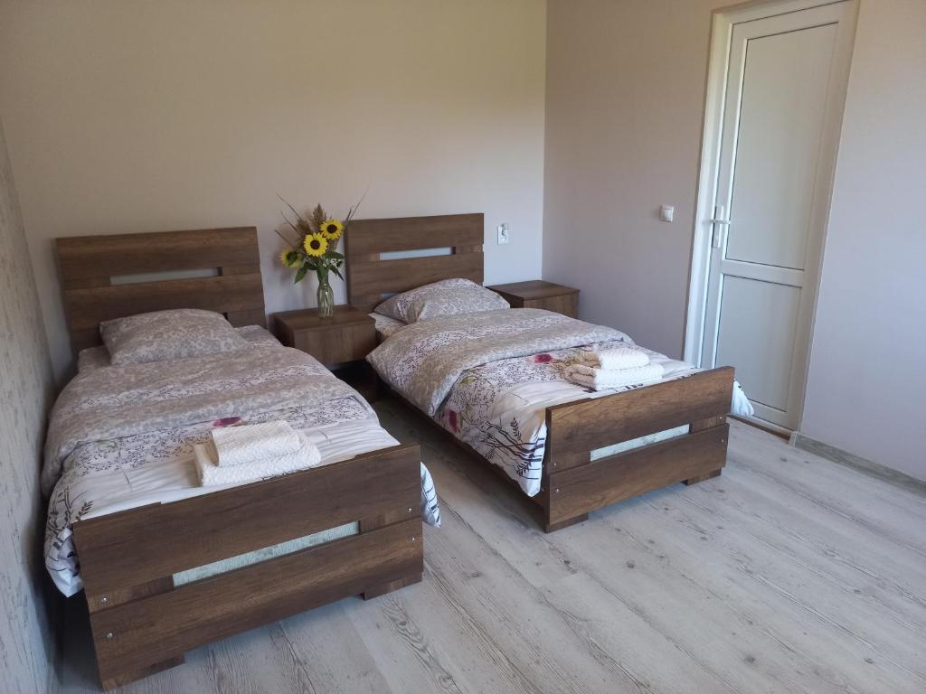 Llit o llits en una habitació de Bee House