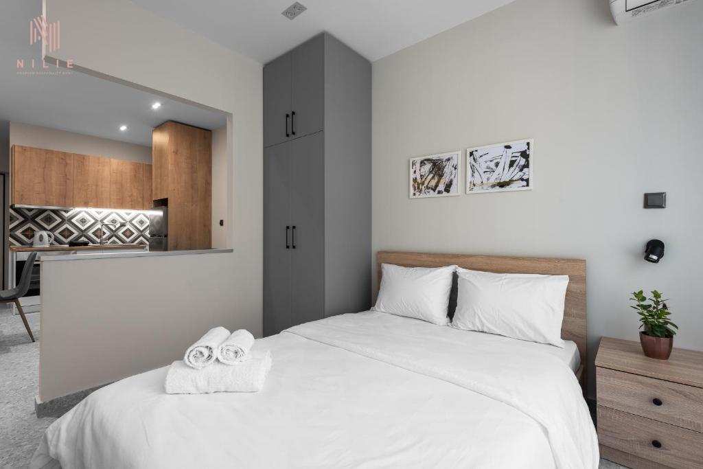 Llit o llits en una habitació de Timesquare, Nilie Hospitality MGMT