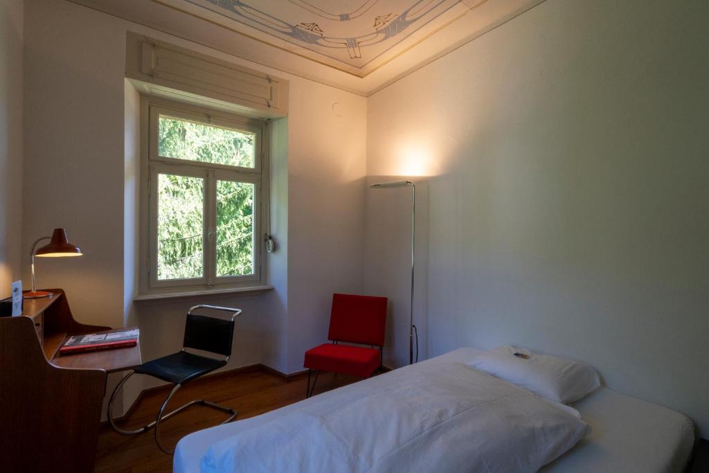Postel nebo postele na pokoji v ubytování Villa Pineta