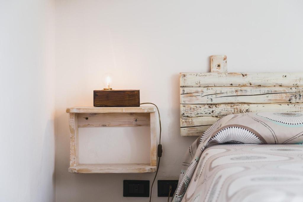 Postel nebo postele na pokoji v ubytování Bio Agriturismo Salos
