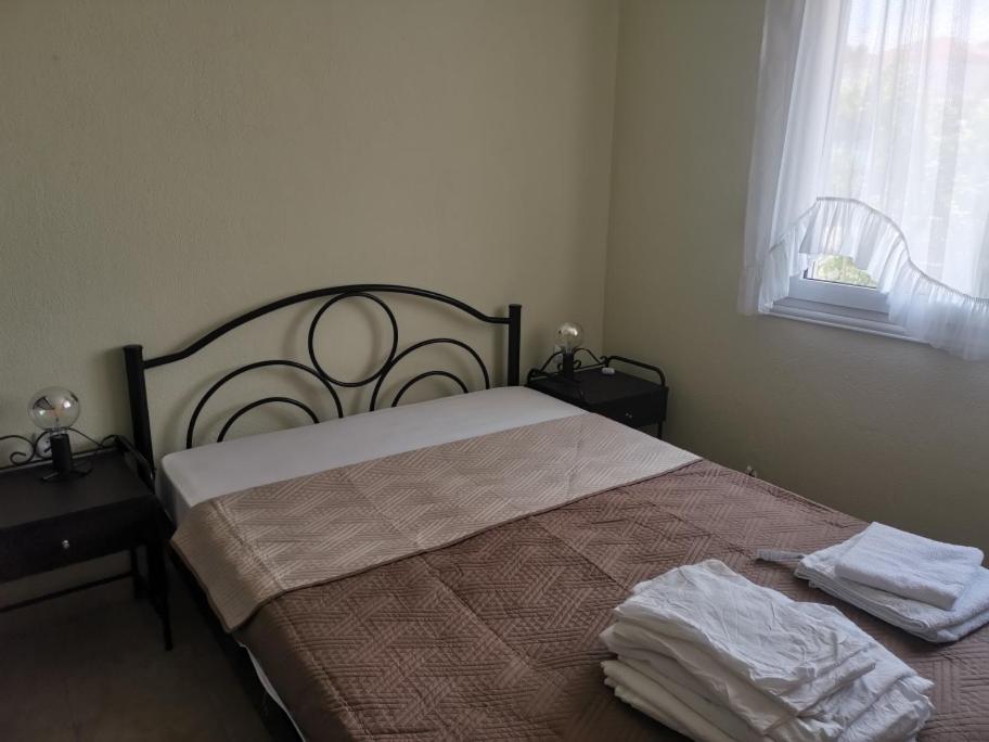 Postel nebo postele na pokoji v ubytování villa VIKTORIA