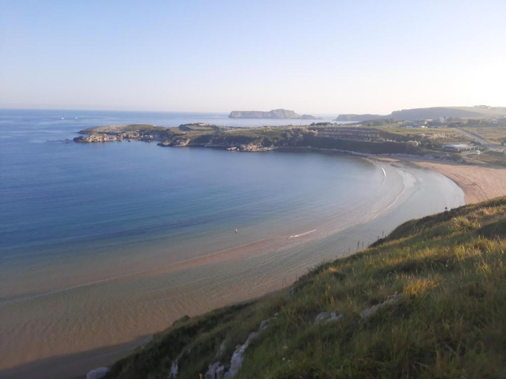 an aerial view of a beach with the ocean at Apartamento Mar deluxe Suances in Suances