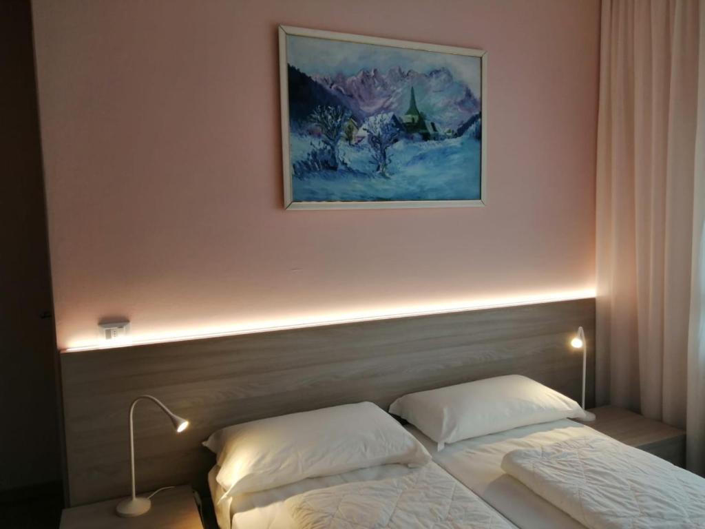 Postel nebo postele na pokoji v ubytování Adriatico Rooms