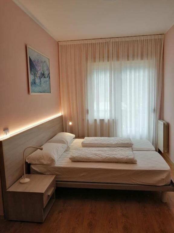 Postel nebo postele na pokoji v ubytování Adriatico Rooms
