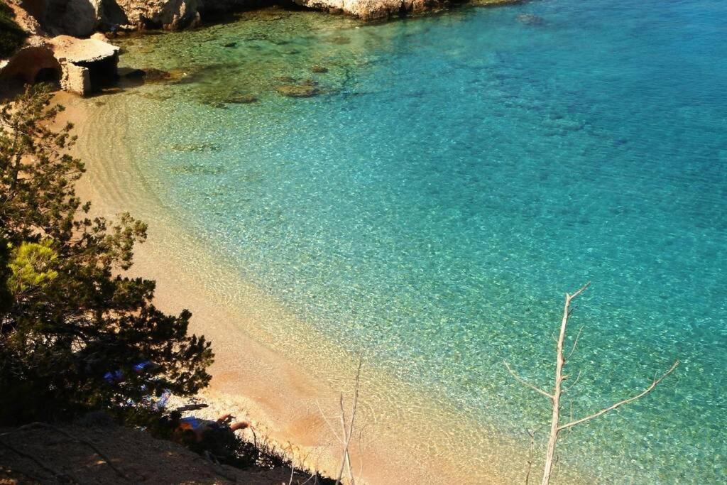 an aerial view of a beach with blue water at AnaMar Eternity House in Asprókambos