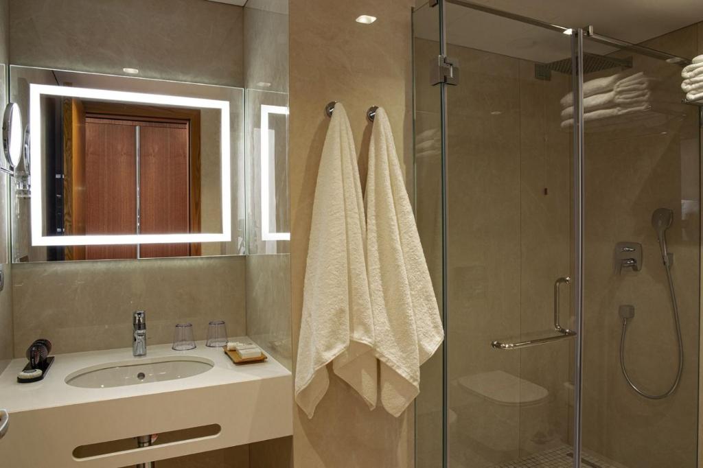 Koupelna v ubytování Amare Hotel