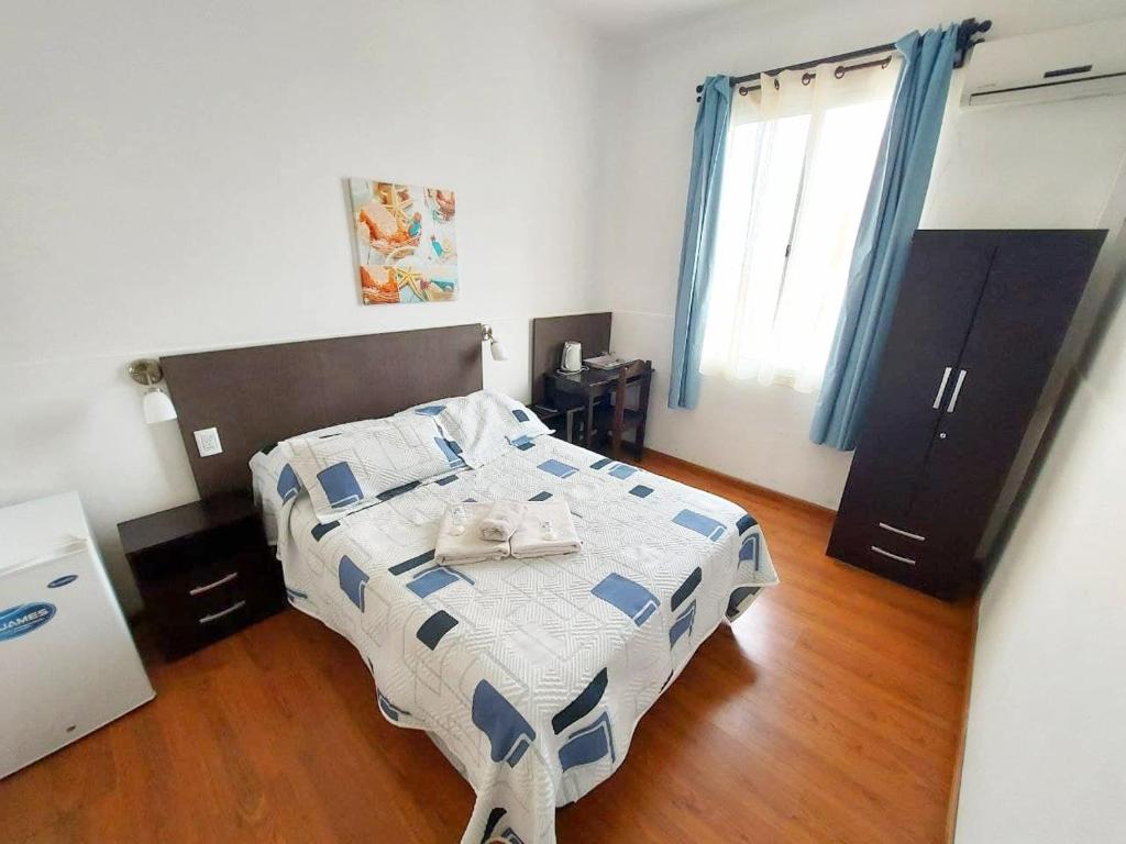 Postel nebo postele na pokoji v ubytování Hotel Mesón Do Vento