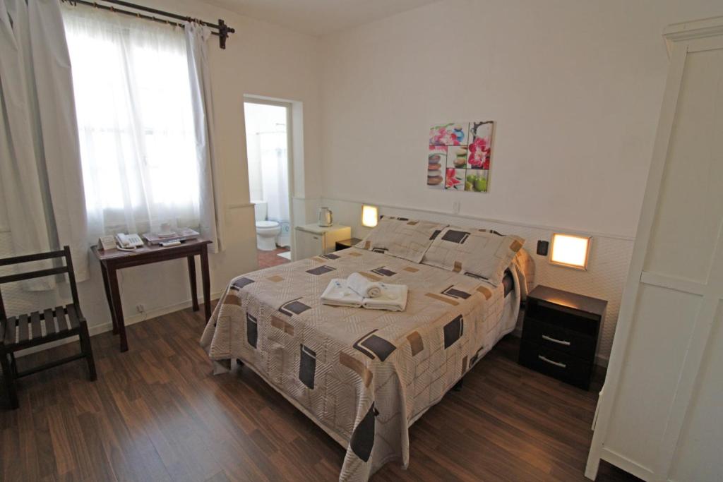 Postel nebo postele na pokoji v ubytování Hotel Mesón Do Vento