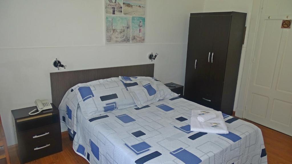 Postel nebo postele na pokoji v ubytování Hotel Mesón Do Vento