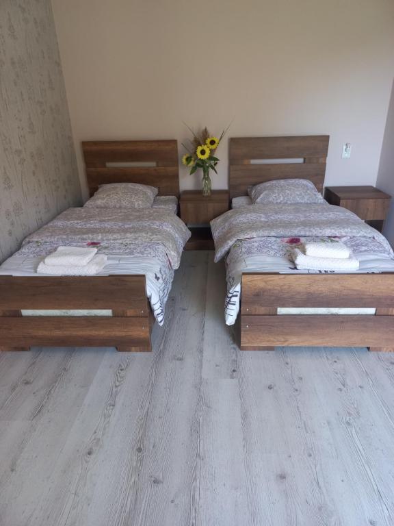 Llit o llits en una habitació de Bee House