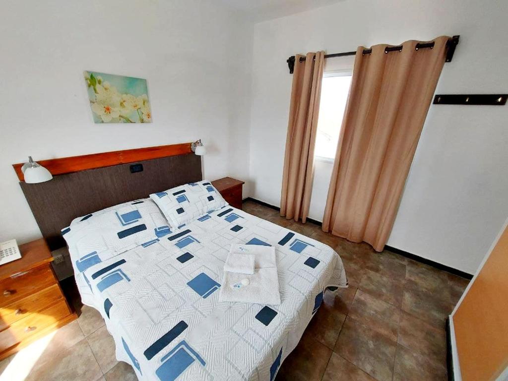 Postel nebo postele na pokoji v ubytování Hotel Mesón Do Vento