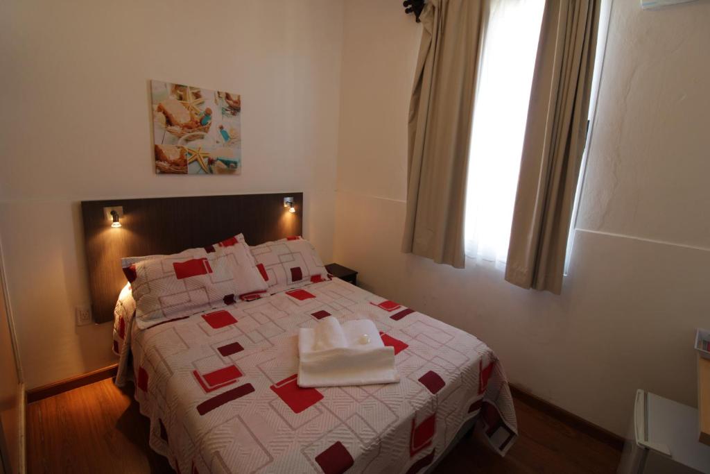 Postel nebo postele na pokoji v ubytování Hotel Mesón Do Vento