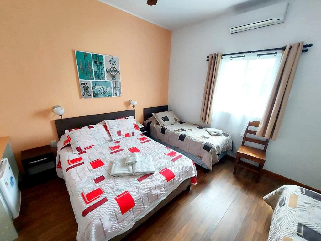 Postel nebo postele na pokoji v ubytování Hotel Mesón Do Vento