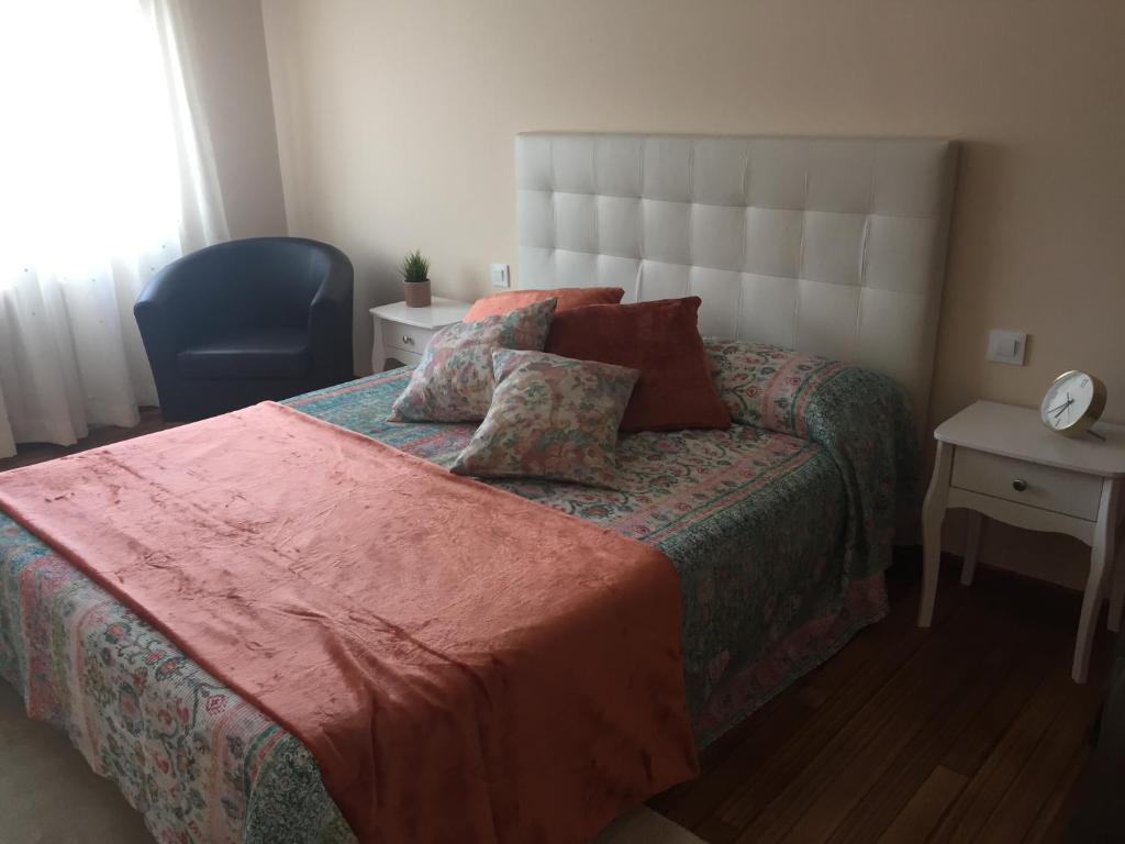 A bed or beds in a room at A CASA DE TOXO