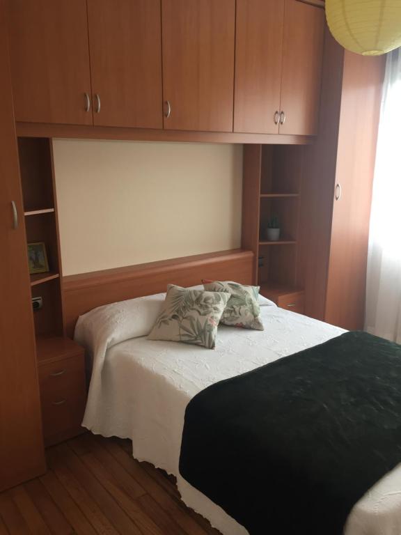 A bed or beds in a room at A CASA DE TOXO