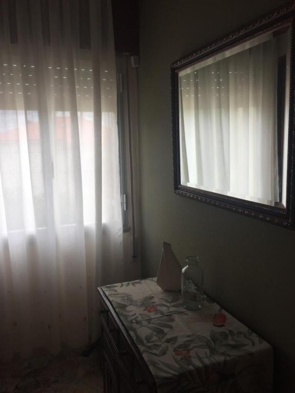 A bed or beds in a room at A CASA DE TOXO