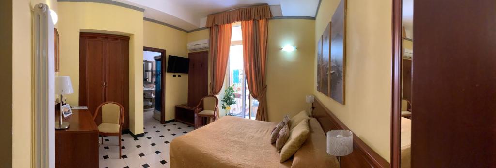 TV a/nebo společenská místnost v ubytování Actor Hotel