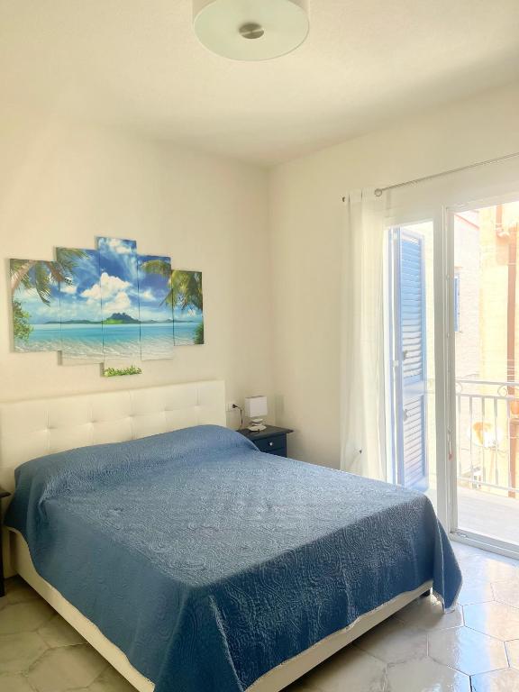 Posteľ alebo postele v izbe v ubytovaní La palma rooms & apartments