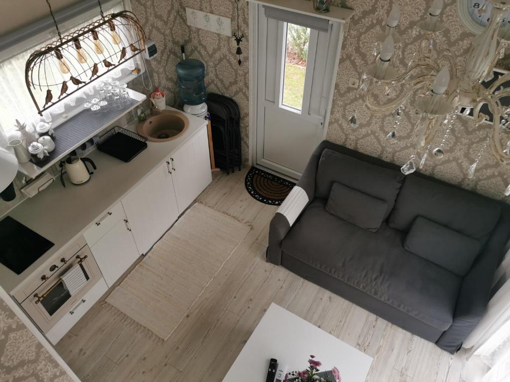 an overhead view of a living room with a couch at Sapņi in Kolka