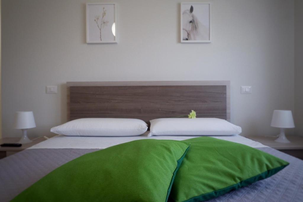 Кровать или кровати в номере Natural House