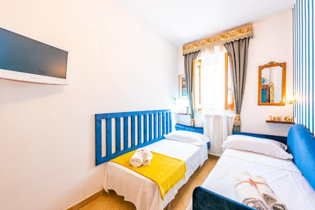 A bed or beds in a room at Extravacanza Safari
