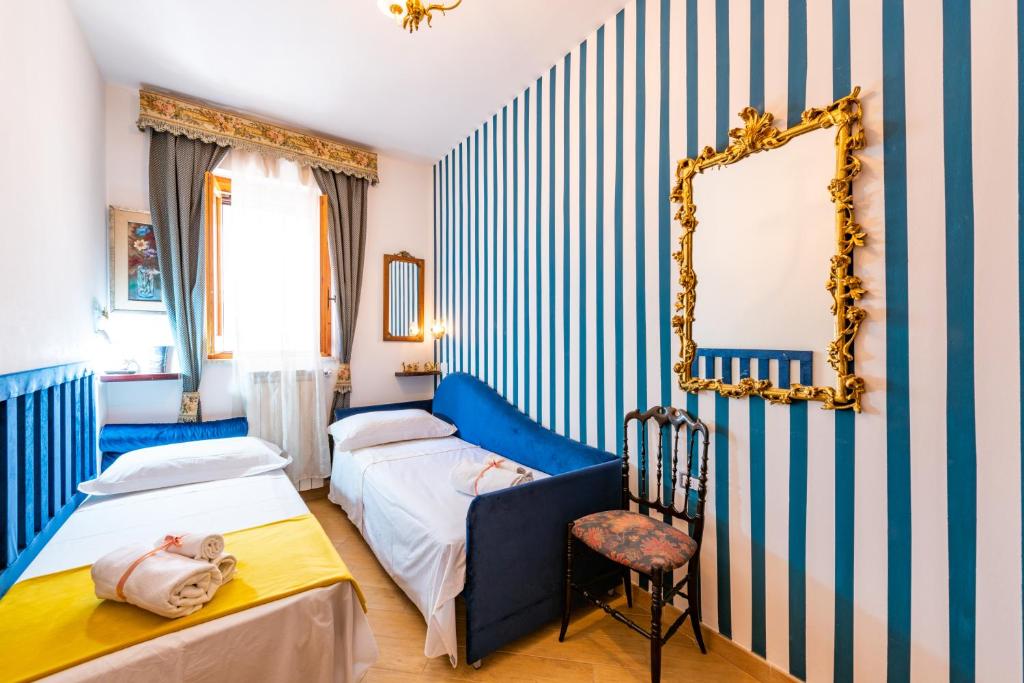 A bed or beds in a room at Extravacanza Safari