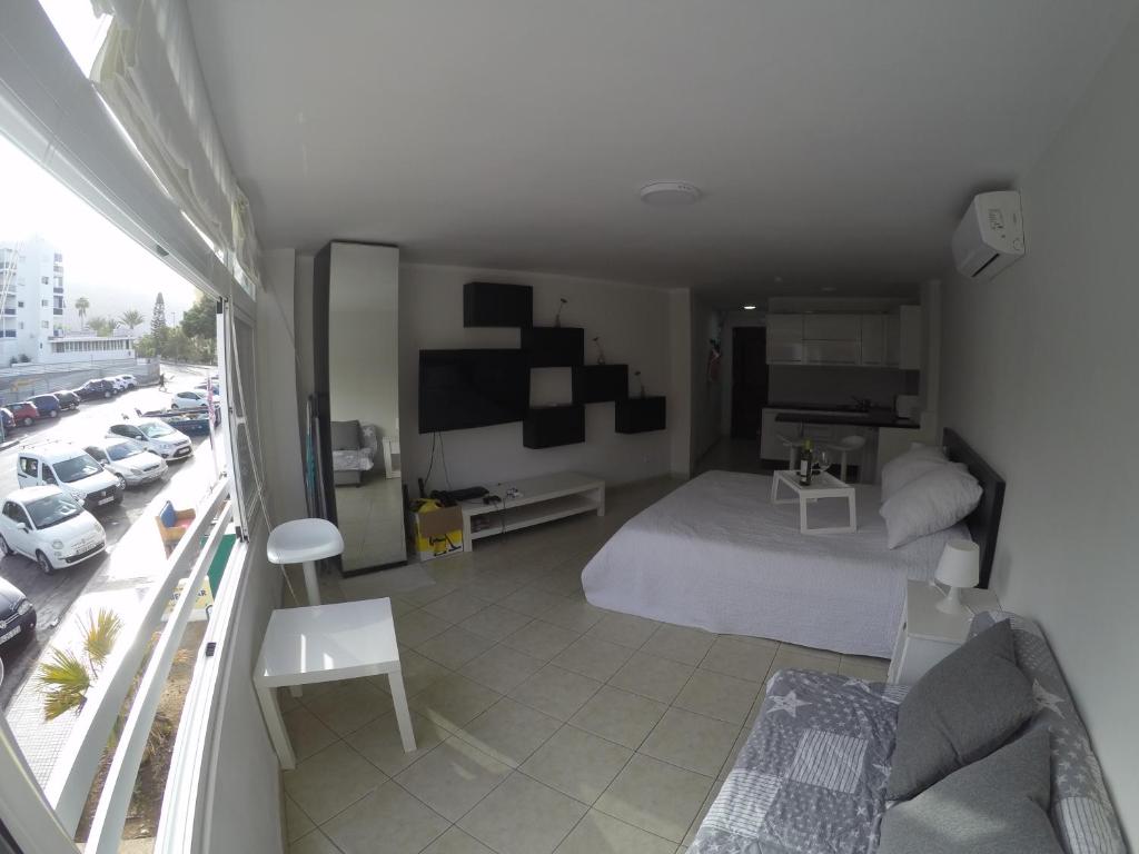 Postel nebo postele na pokoji v ubytování Studio Los Cristianos Beach