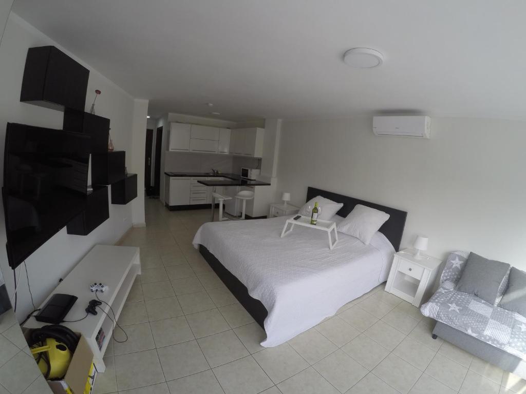TV a/nebo společenská místnost v ubytování Studio Los Cristianos Beach