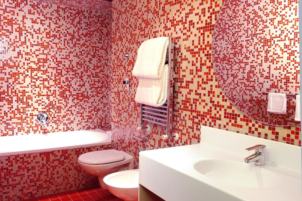 Koupelna v ubytování Hotel Abitart