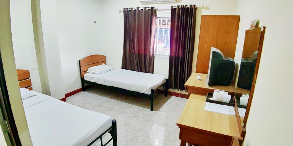 Postel nebo postele na pokoji v ubytování Toon Guesthouse