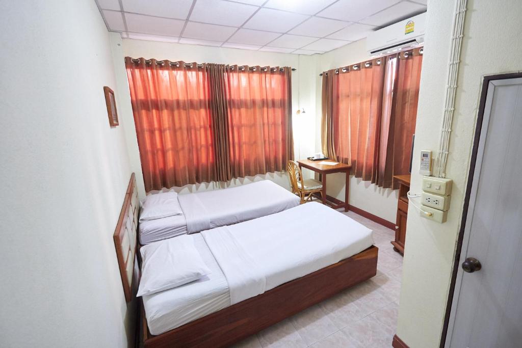 Postel nebo postele na pokoji v ubytování Toon Guesthouse