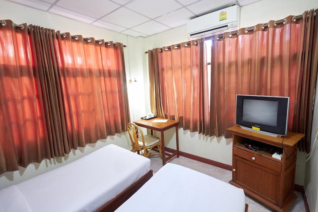 TV a/nebo společenská místnost v ubytování Toon Guesthouse
