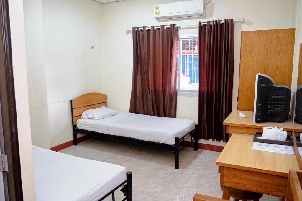 Postel nebo postele na pokoji v ubytování Toon Guesthouse