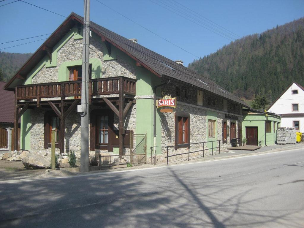 a building on the side of a street at Hostinec Stará Krčma in Stratená