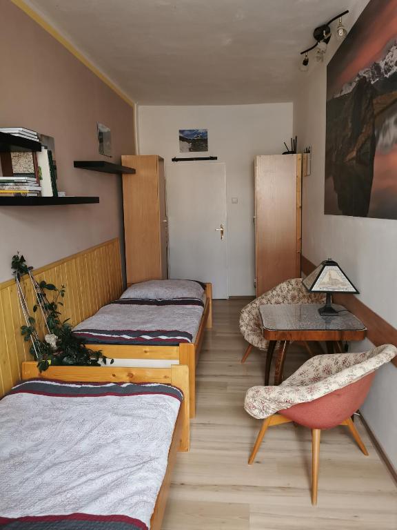 Postel nebo postele na pokoji v ubytování U Černého orla