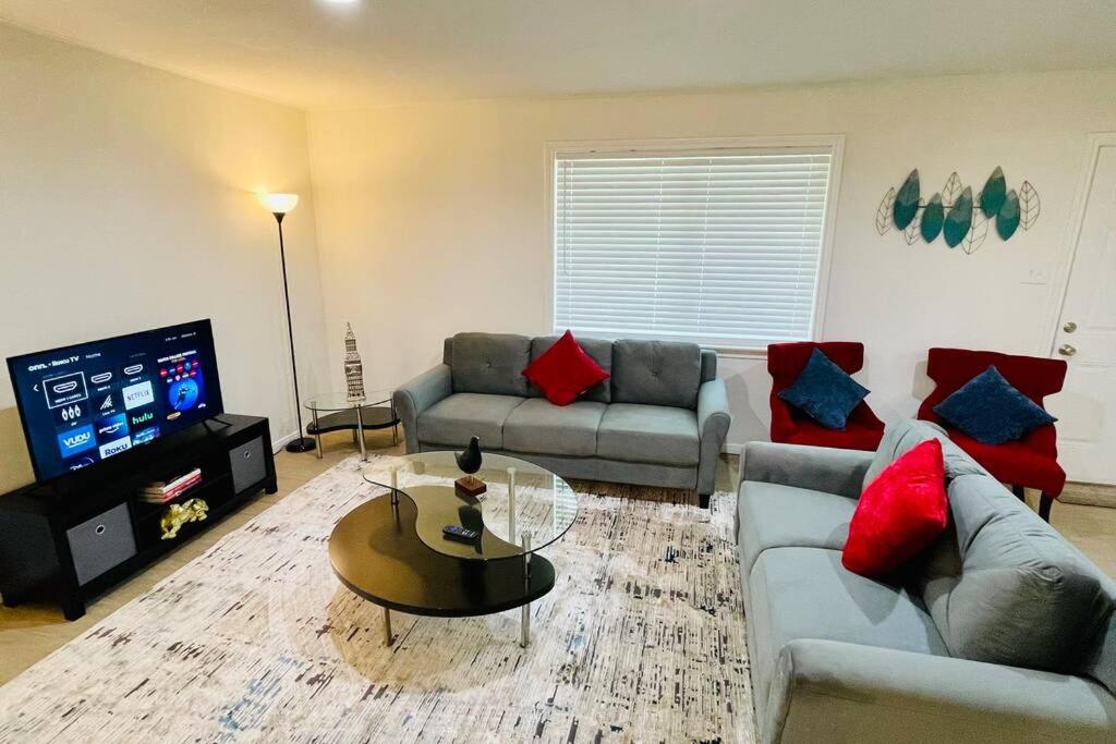 a living room with two couches and a tv at New TEXAN house - 3 Bed, 2 Baths in The Woodlands in Spring