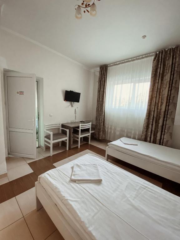 Postel nebo postele na pokoji v ubytování Trio Hotel Restaurant