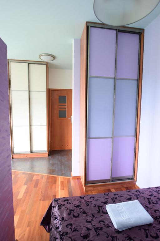 Posteľ alebo postele v izbe v ubytovaní Elegant Apartment Arkadia
