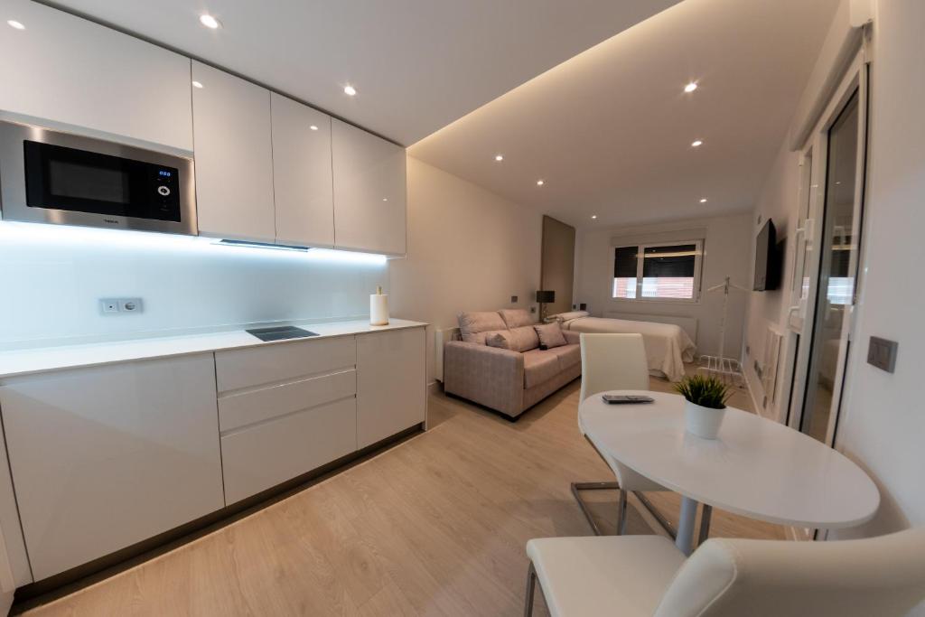 Kuchyňa alebo kuchynka v ubytovaní Apartamentos Palacio de Yolanda