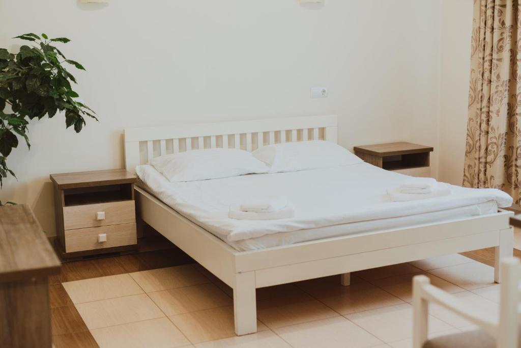 Postel nebo postele na pokoji v ubytování Trio Hotel Restaurant