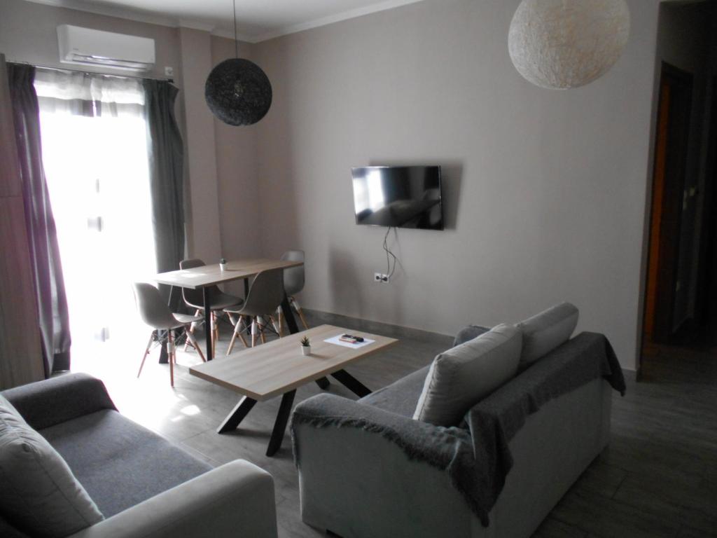 TV a/nebo společenská místnost v ubytování SPΛCES PYLOS Apartments