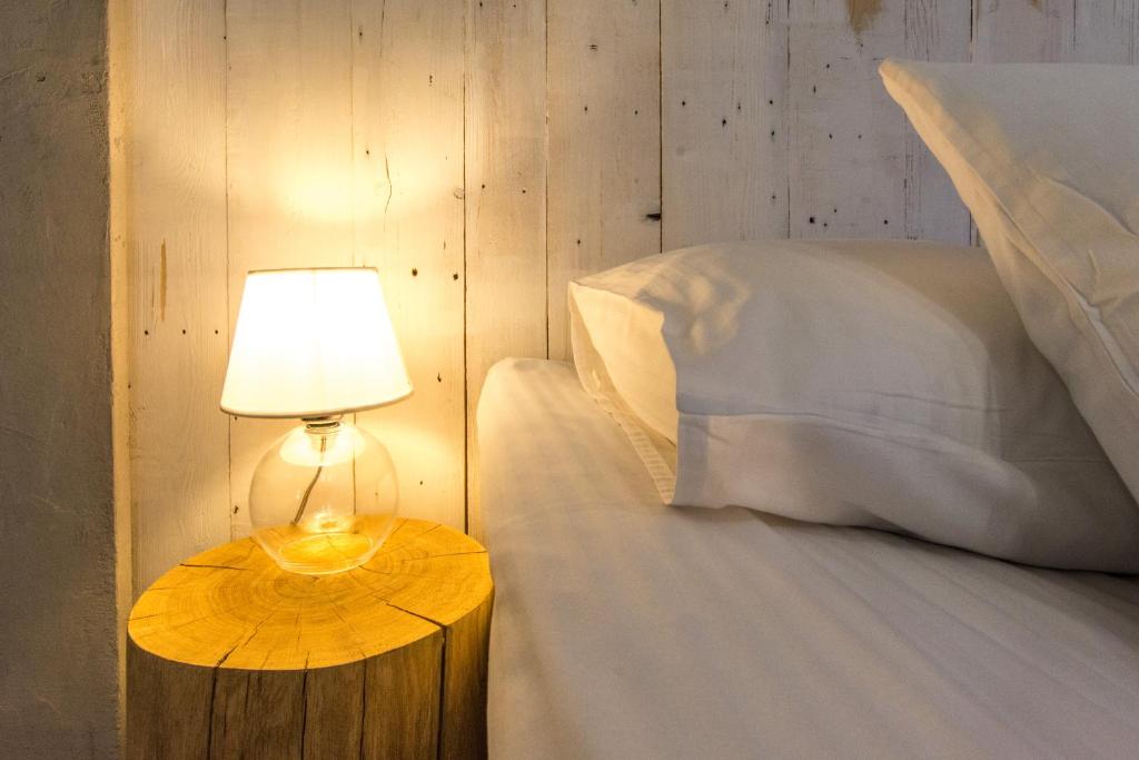 Posteľ alebo postele v izbe v ubytovaní Apartamenty hoteLOVE z sauną