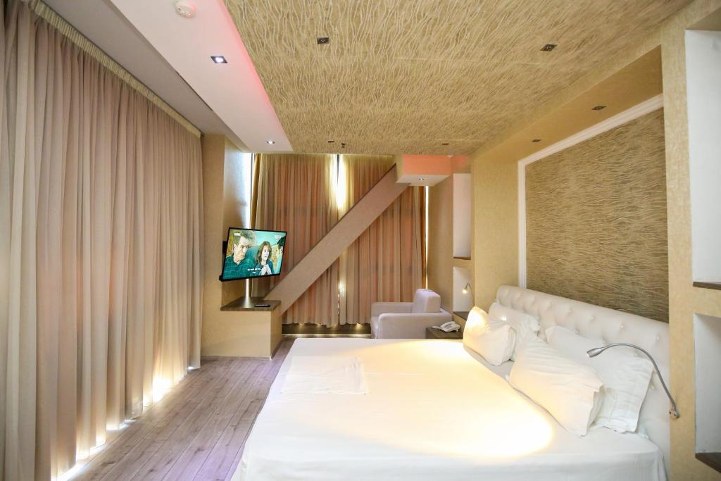 Postel nebo postele na pokoji v ubytování Hotel Partner & SPA