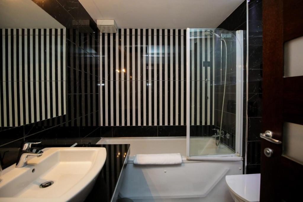 Koupelna v ubytování Hotel Partner & SPA