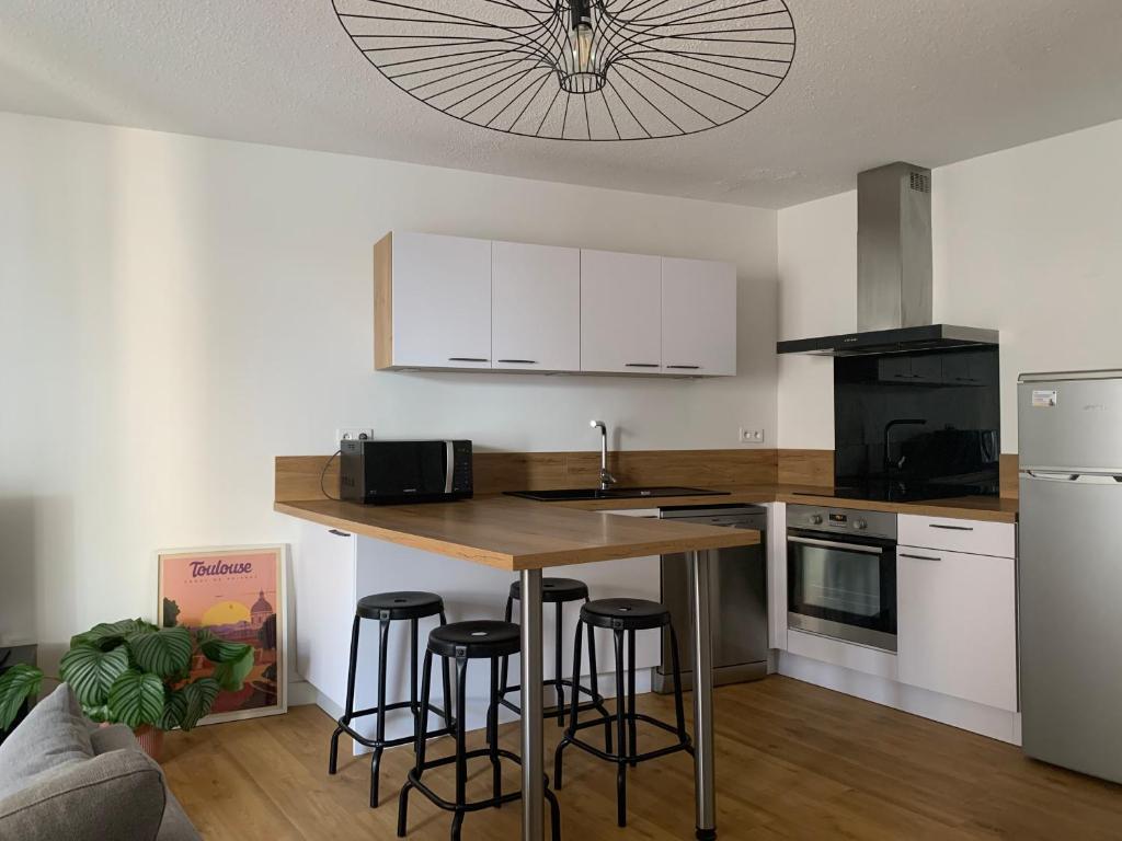 Appartement T2 en centre ville avec terrasse et parking