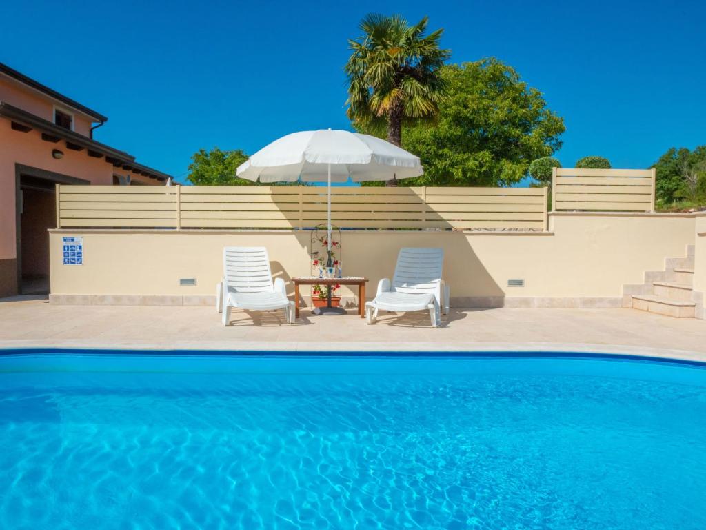 Bazén v ubytovaní Holiday Home Medica by Interhome alebo v jeho blízkosti