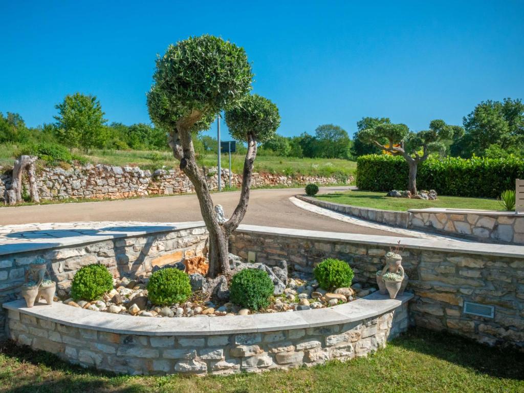 Vonkajšia záhrada v ubytovaní Holiday Home Medica by Interhome
