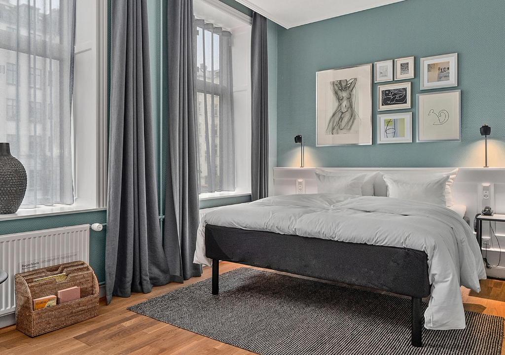 Postel nebo postele na pokoji v ubytování Hotel Kong Arthur