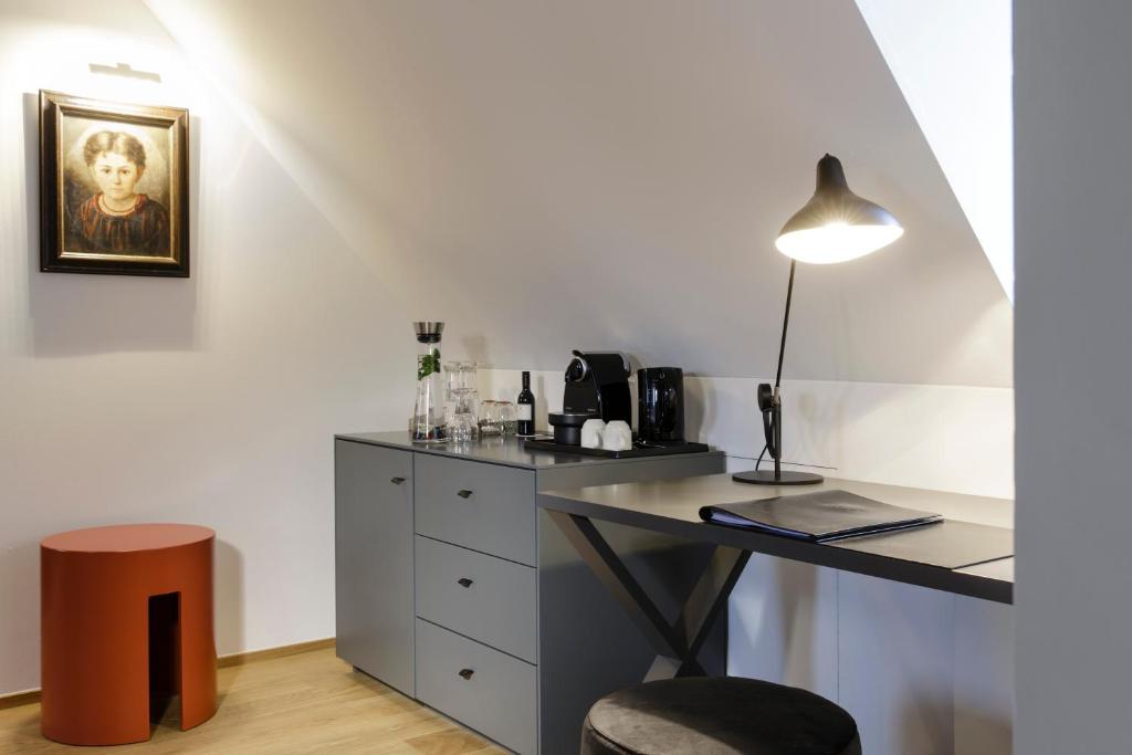 Příslušenství pro přípravu čaje a kávy v ubytování Hotel Maximilian’s