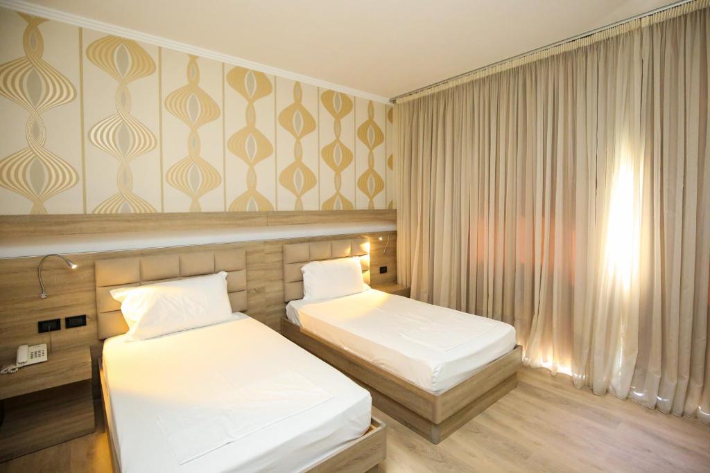 Postel nebo postele na pokoji v ubytování Hotel Partner & SPA
